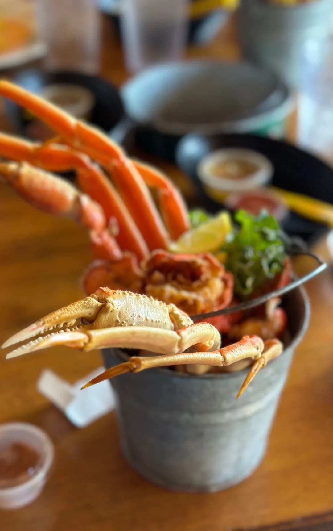 Snow crab legs served with lemon